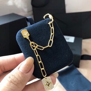 APM Monaco Gold Chain Bracelet with Star Charm